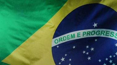 Gerçek Brasilia ulusal bayrağını sallıyor. Güney Amerika 'da seyahat, kutlama afişi, tatiller. Ordem e progresso. Yüksek kalite 