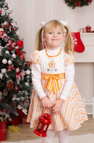 Happy Girl Festive Dress Tails Her Head Christmas Tree Holding — Stock Photo, Image