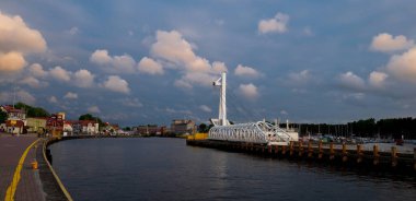 2022-06-02 panoramic view of quay, harbor and swing bridge at mouth of Slupia at baltic sea. Ustka, Poland 