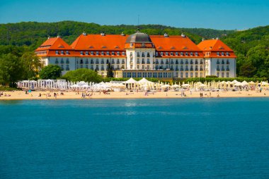2022-06-05. People on the Sopot beach at the Grand Hotel The Grand Hotel is the most sophisticated hotel in Sopot, the main health and tourist resort. poland