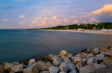 2022-06-02 Embankment of the city Ustka the stones on the background of the Baltic Sea, poland 