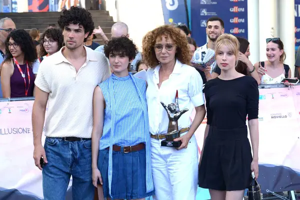 stock image GIFFONI VALLE PIANA,ITALY - July 28,2024 : Tecla Insolia,Giuseppe Spata,Valeria Golino and Alma Noce at Giffoni Film Festival 2024 - on July 28, 2024 in Giffoni Valle Piana, Italy.