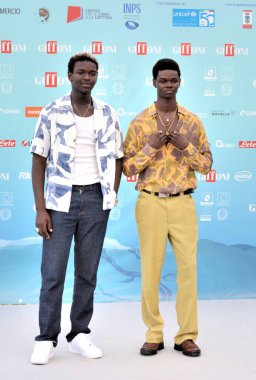 GIFFONI VALLE PIANA,ITALY - July 21,2024 : Seydou Sarr and Moustapha Fall at Giffoni Film Festival 2024 - on July 21, 2024 in Giffoni Valle Piana, Italy. clipart