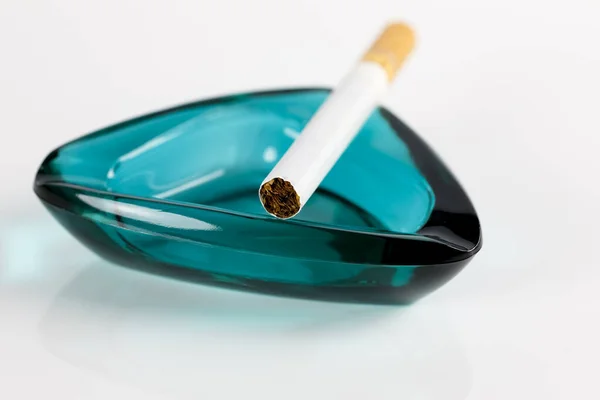 One Unlit Cigarette Has Been Placed Edge Glass Ashtray Which — Stock Photo, Image
