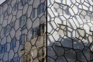 Brussels, Belgium - September 16, 2022: The architectural detail of a modern facade creates the futuristic backdrop of this metropoli