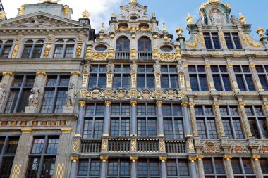 Brussels, Belgium - September 16, 2022: Houses on the Grand Place. From the left, these are House of the Oath of Archers, House of the Corporation of Carpenters, House of the Corporation of Greaser