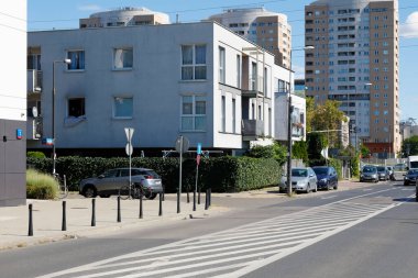 Warsaw, Poland - September 2, 2022: Multi-family residential buildings located on the city street in the Goclaw estate in the Praga Poludnie distric