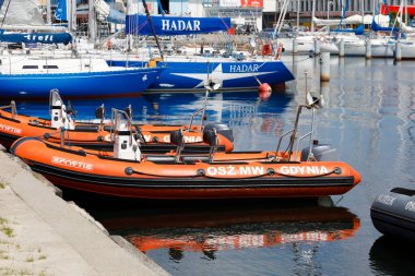 Gdynia, Poland - June 3, 2022: Various boats, motorboats and sailboats are moored in the marina located at the southern pier of the port of Gdynia on the Baltic Sea in the Bay of Gdans