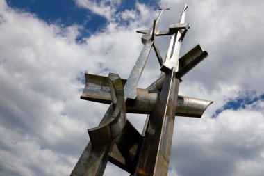 Gdynia, Poland - June 3, 2022: Three Masts or Sails is a sculpture by Wawrzyniec Samp, which was unveiled in 1980 on Kosciuszko Square, i.e. on the southern pier of the port