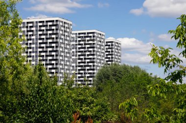 Warsaw, Poland - July 3, 2022: Overall view of contemporary, multi-storey residential buildings in the Goclaw housing estate, in the Praga Poludnie district 