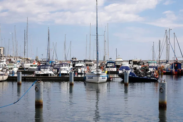 Gdynia, Poland - June 3, 2022: Various boats, motorboats and sailboats are moored in the marina located at the southern pier of the port of Gdynia on the Baltic Sea in the Bay of Gdans