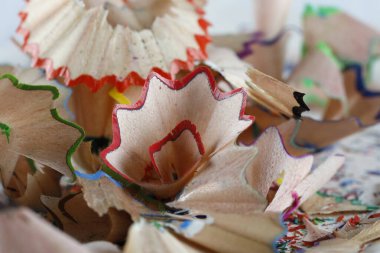 A pile of wooden shavings from sharpening colored pencils can now simply be used as a creative background.