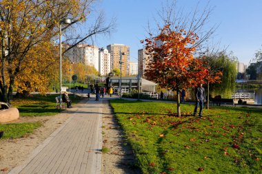 Warsaw, Poland - November 6, 2022: Multi-storey apartment buildings are adjacent to extensive park areas here in the Goclaw estate, in the Praga Poludnie district