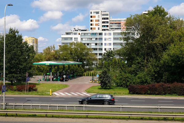 Warsaw, Poland - July 30, 2023: General view of the southern end of the Goclaw housing estate. Nearby, on the city street, you can see a petrol statio
