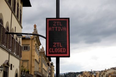 Florence, Italy - April 17, 2023: Limited traffic zone sign. ZTL is a traffic zone where car access is controlled to protect air quality, usually in the historic city centre clipart