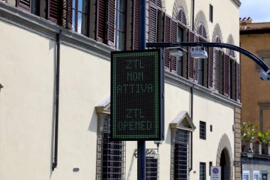 Florence, Italy - April 16, 2023: Limited traffic zone sign. ZTL is a traffic zone where car access is controlled to protect air quality, usually in the historic city centre clipart