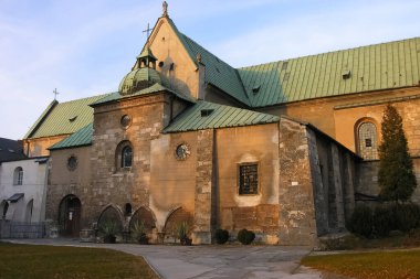 Jedrzejow, Poland - November 4, 2005: The Church of the Assumption of the Blessed Virgin Mary, Saint Wojciech and Blessed Wincenty Kadlubek. The church was founded in 1140. clipart