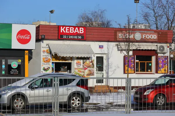 stock image Warsaw, Poland - January 19, 2024: Small buildings are the commercial pavilions. These pavilions are located along a street in the Goclaw area of the Praga-Poludnie district.