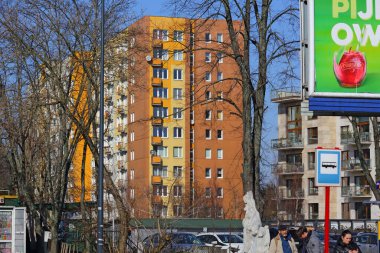 Warsaw, Poland - March 9, 2024: Large block of flats in a snowless, sunny winter on Miedzynarodowa Street in the Saska Kepa subdivision of the Praga-Poludnie district. clipart