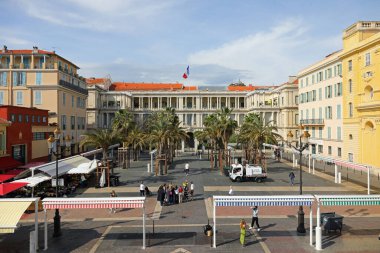 Nice, France - April 21, 2023: View over the almost empty Pierre Gautier square next to the Cours Saleya, known for its famous market which takes place here in Old Nice clipart