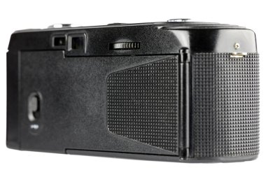 35 mm 'lik film için eski bir kompakt kamera, arka ve yan görüş. Kapalı film bölümünün kapağı görülebilir..