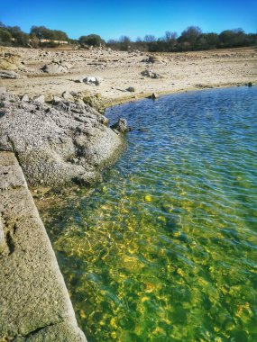 transparent waters on the shores of a lake