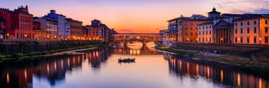 Sunset cityscape with the famous bridge of Ponte Vecchio on the river Arno River in Centro Storico, Florence, Italy