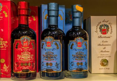Florence, Italy - June 03, 2022: bottles of Bertoni balsamic vinegar from Modena aged from 4 to 8 years at a shop in Central Market Mercato Centrale