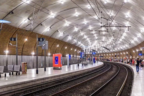 stock image Monte Carlo, Monaco - May 27, 2022: Train tracks disappearing into the tunnel and lights at the underground train station in Cote d Azur