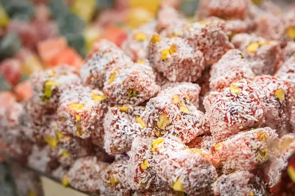 Selection of turkish delight or rahat lokum and nougat candy on display at a bustling bazaar market, trade and food culture, Istanbul, Turkey