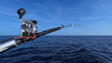 Akdeniz 'de mavi gökyüzünün altında tuzlu su oltası ve olta balığı.