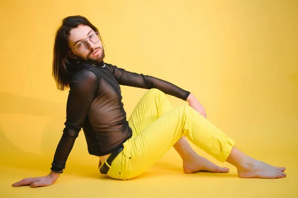 stock image Portrait of a gay man on a colored background. Gender equality. The concept of the LGBT community. Equality