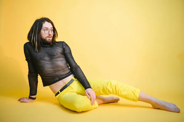 stock image Portrait of a gay man on a colored background. Gender equality. The concept of the LGBT community. Equality