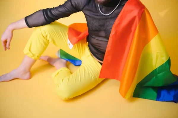 stock image Youth transgender LGBT with Rainbow flag on shoulder isolated color background. gender expression pride and equality concept