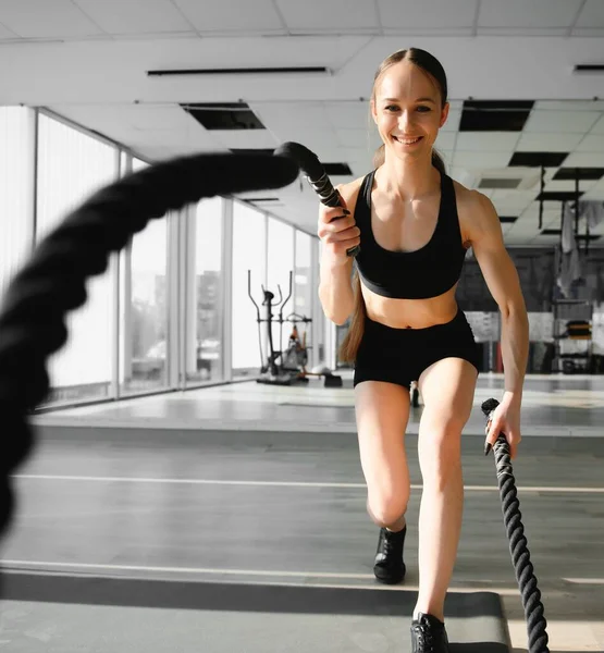 Athletic Female Gym Exercises Battle Ropes Her Fitness Workout High — Stockfoto