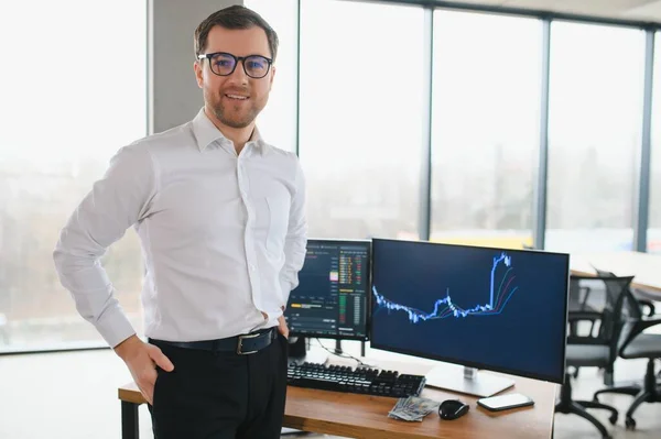 stock image Serious business man trader analyst looking at computer monitor, investor broker analyzing indexes, financial chart trading online investment data on cryptocurrency stock market graph on pc screen