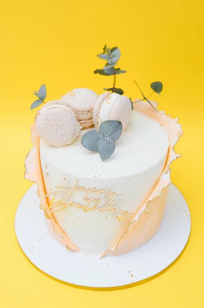 birthday cake over yellow background