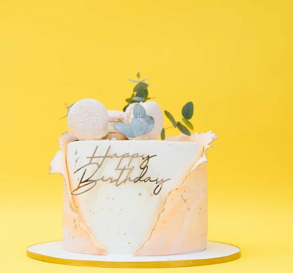 birthday cake over yellow background