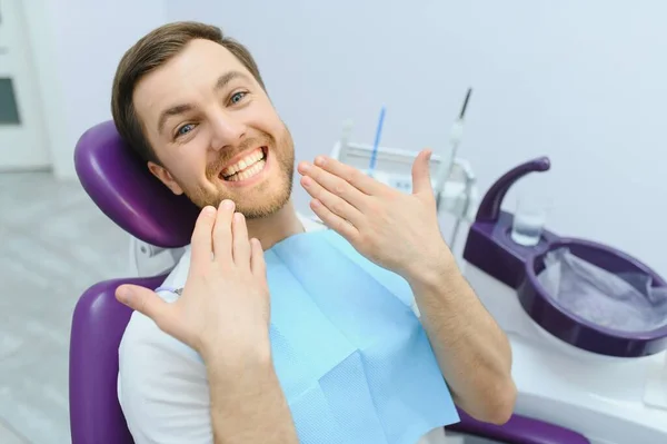 Young Bearded Man Sitting Dental Chair Visiting Modern Dental Clinic — Stock Photo, Image