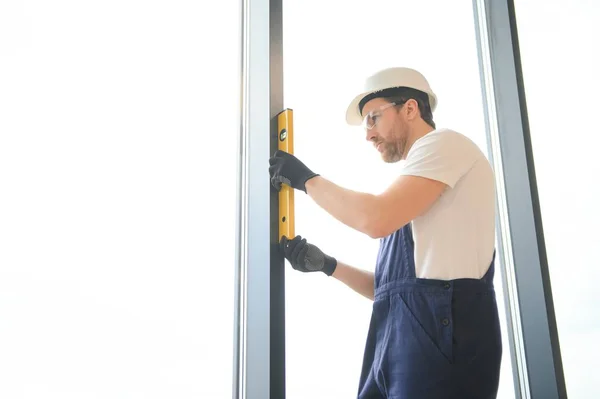 Handsome Young Man Installing Bay Window New House Construction Site — Stock Photo, Image