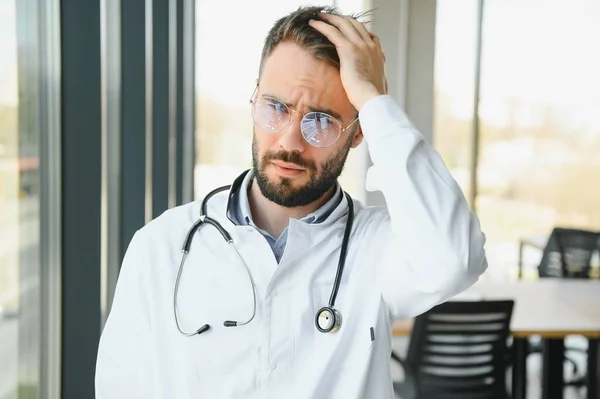 Stressed Male Doctor Mid Adult Male Doctor Working Long Hours — Stockfoto
