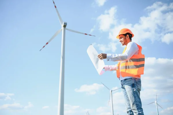 stock image Windmill engineer inspection and progress check wind turbine.