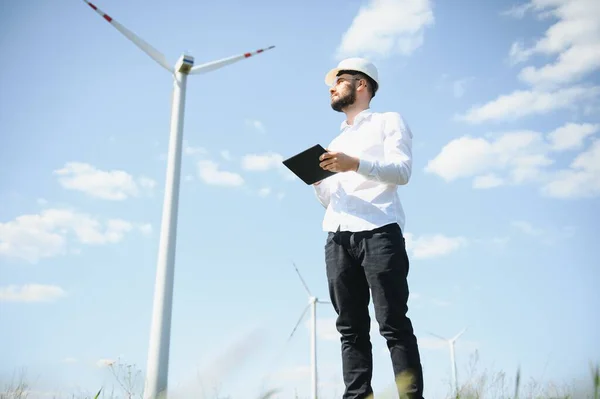 stock image Power engineer are working with wind turbines