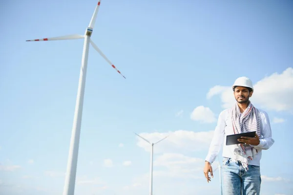 stock image Windmill engineer inspection and progress check wind turbine.