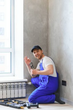 ısıtma sistemi kurulum ve bakım hizmeti. tesisatçı yükleme radyatör