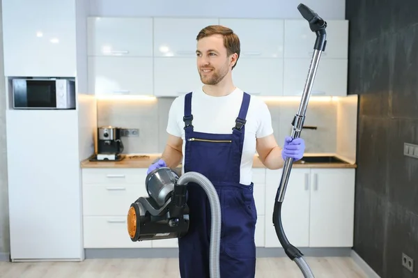 Man Cleaning Flat Vacuum Cleaner — Stock Photo, Image