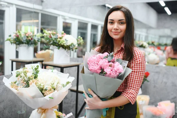 Startup successful sme small business entrepreneur owner woman standing with flowers at florist shop service job. Portrait of caucasian girl successful owner environment friendly concept banner.