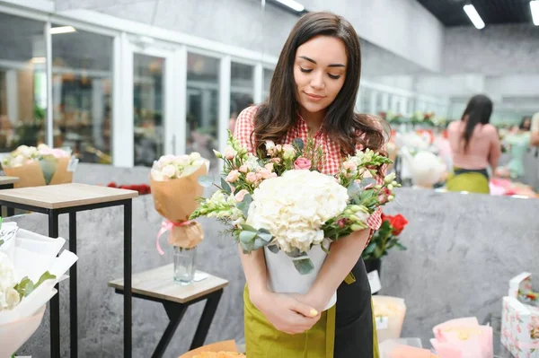 Startup successful sme small business entrepreneur owner woman standing with flowers at florist shop service job. Portrait of caucasian girl successful owner environment friendly concept banner.