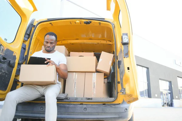 Logistics, delivery car and man with clipboard paperwork or checklist for stock, product distribution or shipping info.