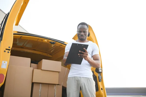 Logistics, delivery car and man with clipboard paperwork or checklist for stock, product distribution or shipping info.